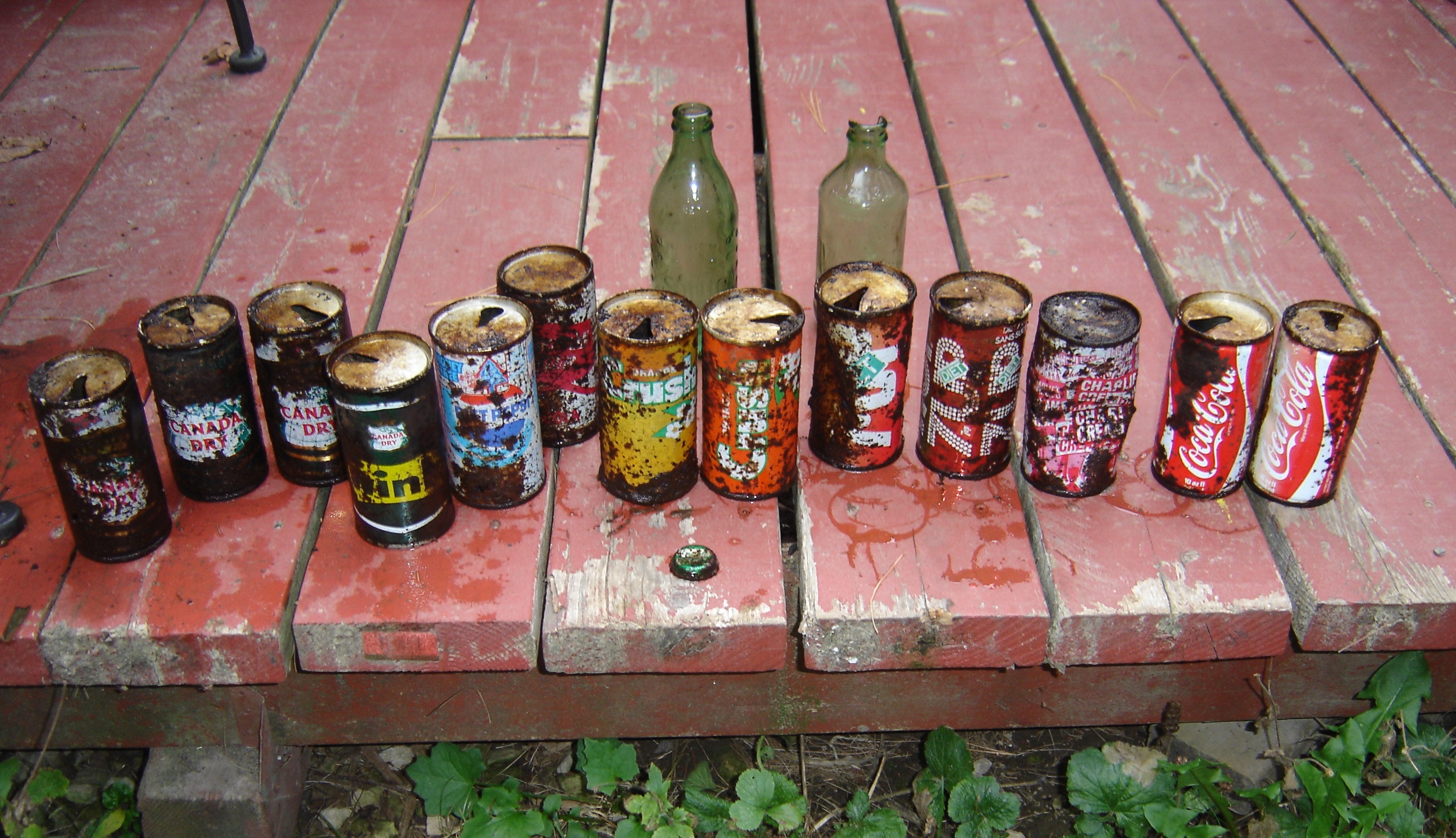 poked around an old site and found more metal cans | Antique Bottles ...